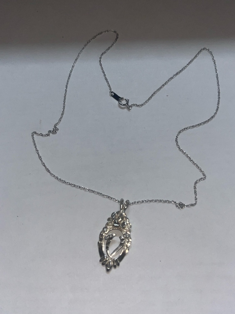 Vintage . 925 initial V pendant on an 18 inch chain.